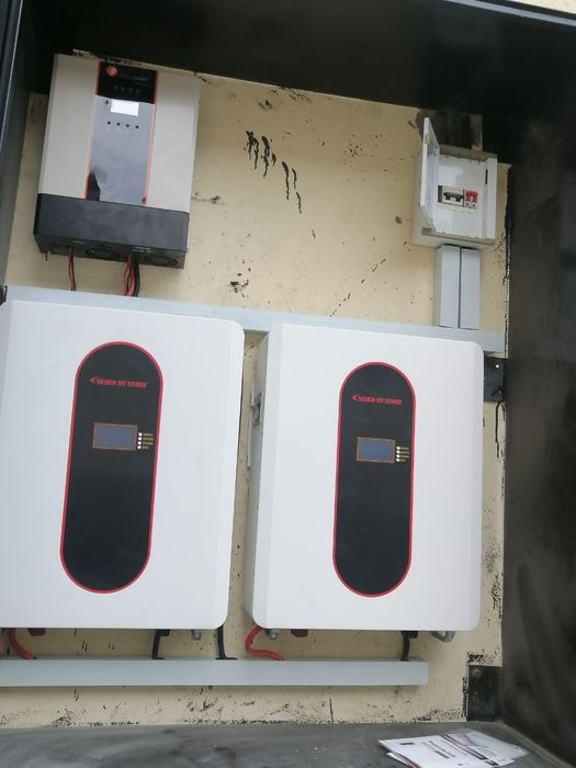 Inverter and two wall-mounted lithium batteries
