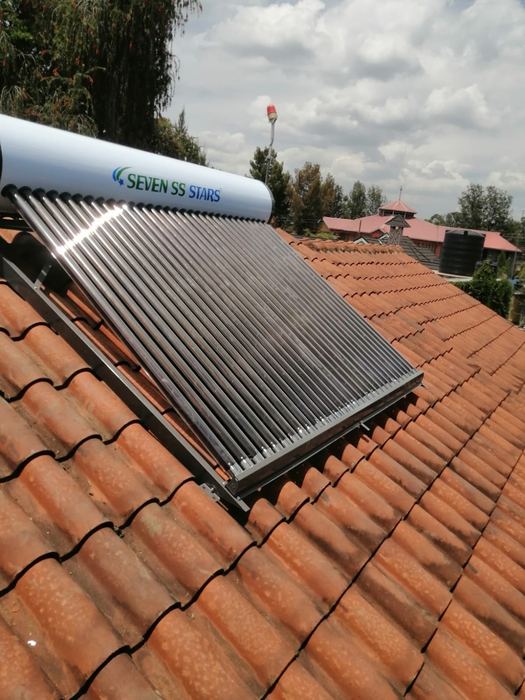 Solar water heater installed on a tiled roof